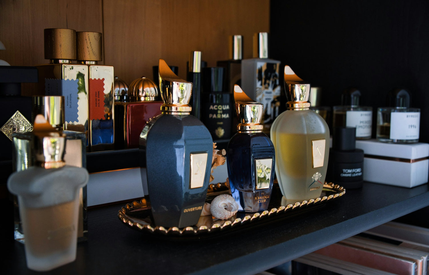 Shelf of fragrance decant bottles
